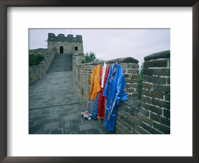 Colorful Chinese Robes Are Displayed Along The Great Wall by Jodi Cobb Pricing Limited Edition Print image