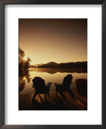 Pair Of Adirondack Chairs On A Dock At The Mirror Lake Inn by Michael Melford Pricing Limited Edition Print image