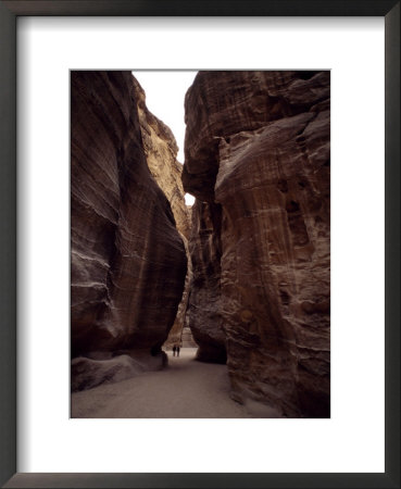Hikers In The Siq Canyon Leading To Petra by Gordon Wiltsie Pricing Limited Edition Print image