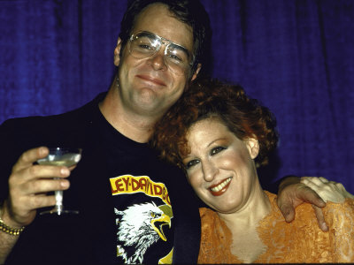 Actor Dan Aykroyd And Actress Singer Bette Midler by David Mcgough Pricing Limited Edition Print image