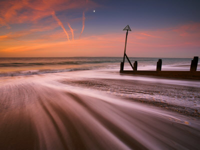 Surging Tide At Dawn On A Hayling Island Beach, Hampshire, England by Adam Burton Pricing Limited Edition Print image