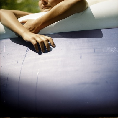 A Young Woman In An Inflatable Swimming Pool by Jewgeni Roppel Pricing Limited Edition Print image