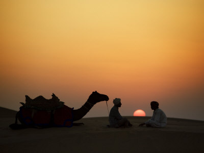 Camel And Men At Sunset In The Dessert by Scott Stulberg Pricing Limited Edition Print image