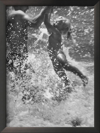Father And Daughter Playing In The Surf At Jones Beach by Alfred Eisenstaedt Pricing Limited Edition Print image