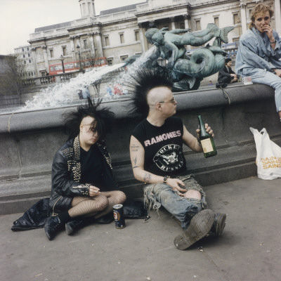 Punks Drinking In Trafalgar Square, London by Shirley Baker Pricing Limited Edition Print image