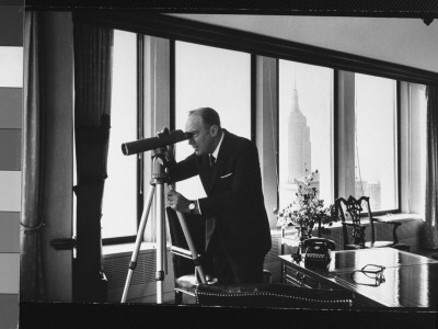 Secretary Of State Designate William Rogers Peering Through Telescope, Out Of His Office Window by Alfred Eisenstaedt Pricing Limited Edition Print image