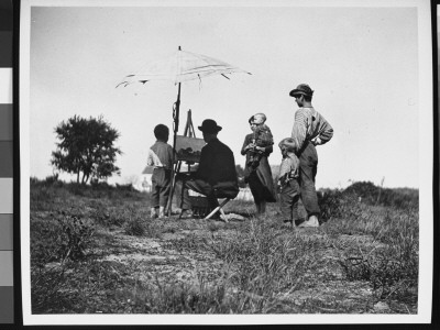 Under An Umbrella, Painting A Landscape, Surrounded By Wife And Children At Canarsie by Wallace G. Levison Pricing Limited Edition Print image