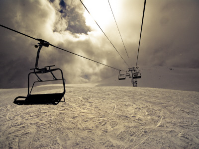 Chairlift On Whistler In Cloudy Storm by David Elton Pricing Limited Edition Print image