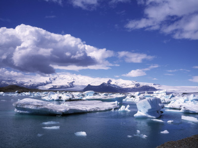 Ice-Floes In A Lake By A Glacier, Jokulsarlon, Iceland by Kristjan Maack Pricing Limited Edition Print image