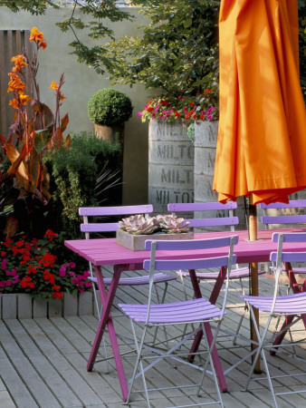 Pink Wooden Table And Orange Parasol by Clive Nichols Pricing Limited Edition Print image