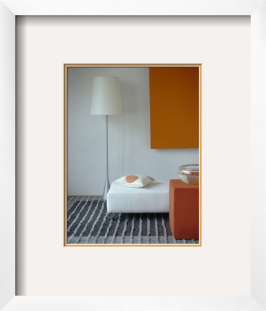 White Living Room With Minimal Lampstand And Orange Accessories by Richard Powers Pricing Limited Edition Print image