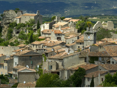 View Of The Village Of Saignon, With Red Tile Roofs On Stone Houses by Stephen Sharnoff Pricing Limited Edition Print image