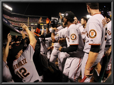 Texas Rangers V. San Francisco Giants, Game 5: Giants Celebrate An Edgar Renteria Three-Run Home Ru by Doug Pensinger Pricing Limited Edition Print image