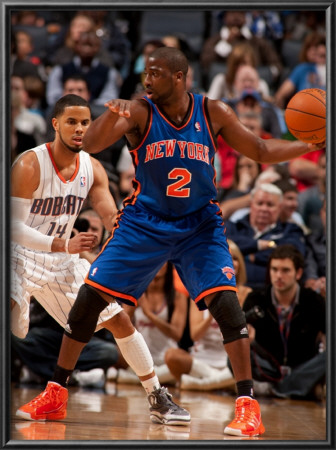 New York Knicks V Charlotte Bobcats: Raymond Felton And D.J. Augustin by Kent Smith Pricing Limited Edition Print image