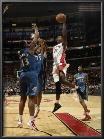 Washington Wizards V Toronto Raptors: Ed Davis, Kevin Seraphin And Trevor Booker by Ron Turenne Pricing Limited Edition Print image