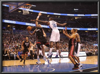 Miami Heat V Orlando Magic: Dwyane Wade And Brandon Bass by Mike Ehrmann Pricing Limited Edition Print image