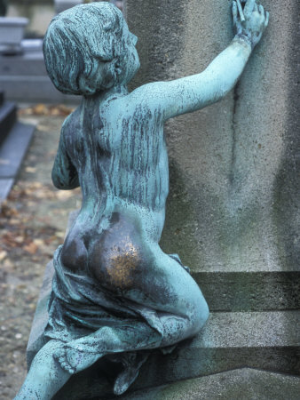 Statue Of Small Boy Writing On Tomb, Showing Bare Brass Where Rubbed by Stephen Sharnoff Pricing Limited Edition Print image