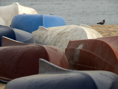 Overturned Fishing Boats Make Patterns On A Beach In Spain by Stephen Sharnoff Pricing Limited Edition Print image