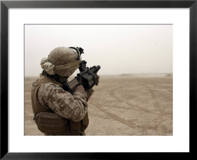A Grenade From A M-32 Grenade Launcher Appears As A Speck Against A Bleak Sandstorm Sky by Stocktrek Images Pricing Limited Edition Print image