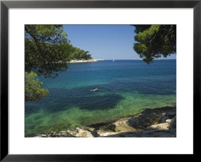 Woman Swimming Off The Dalmatian Coast, Cavtat, Dalmatia, Croatia by Graham Lawrence Pricing Limited Edition Print image