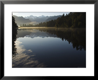 Lake Matheson In The Evening Reflecting Mount Tasman And Aoraki, South Island, New Zealand by Chris Kober Pricing Limited Edition Print image