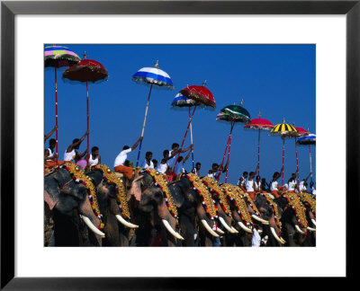 Men Riding Decorated Elephants At Annual Pooram Festival, Thrissur, India by Paul Beinssen Pricing Limited Edition Print image