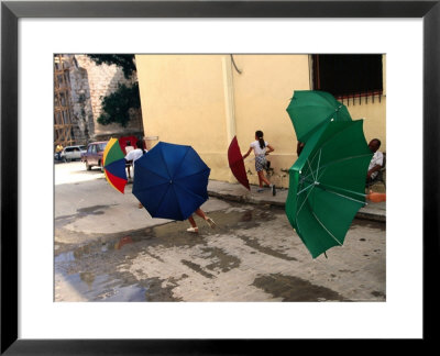 Girls With Umbrellas In Street Of Old Havana, Havana, Cuba by Rick Gerharter Pricing Limited Edition Print image