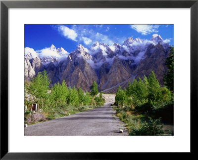 Road Of The Karakoram Highway Leading Towards Cloud-Swathed Mountains by Lindsay Brown Pricing Limited Edition Print image