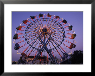 People Ride An Upsidedown Ferris Wheel In Wildwood, New Jersey by Richard Nowitz Pricing Limited Edition Print image