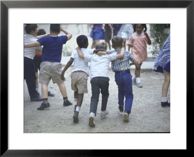 At The Desegregated Lusher School Three Boys Display Camaraderie Walking Through Playground by Bill Eppridge Pricing Limited Edition Print image