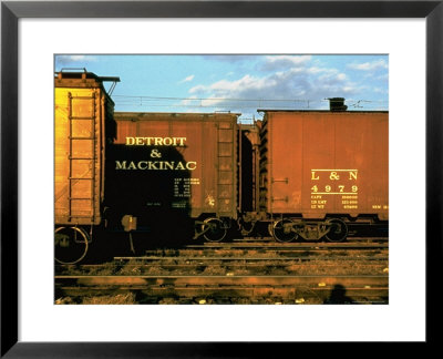 Railroad Box Cars Idle In Train Yard, Lit By Early Morning Sunlight by Walker Evans Pricing Limited Edition Print image