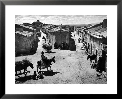 Spanish Village Showing Rows Of Crude Stone And Adobe Houses by W. Eugene Smith Pricing Limited Edition Print image