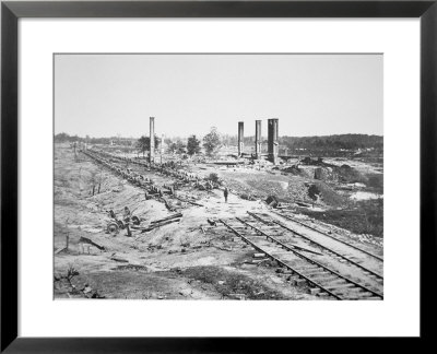 Ruins Of Hood's 28-Car Ammunition Train And Scofield Rolling Mill, Atlanta, Georgia, September 1864 by G.N. Barnard Pricing Limited Edition Print image