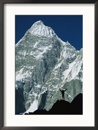 A Climber Silhouetted Against Mountains In The Karakoram Range by Jimmy Chin Pricing Limited Edition Print image