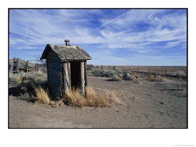 An Old Outhouse Leans With Age And Decay by Jodi Cobb Pricing Limited Edition Print image