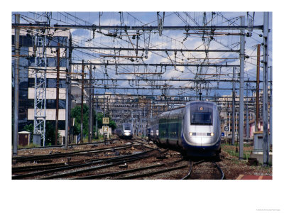 Tgv High-Speed Train Travelling Along City Tracks, Paris, France by John Elk Iii Pricing Limited Edition Print image