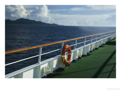 Deck Of A Cruise Ship In The South Pacific Ocean With A Volcanic Island In The Background by Todd Gipstein Pricing Limited Edition Print image