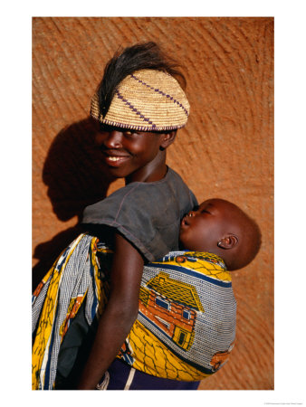 Betamaribe (Somba) Girl With Baby Brother Sleeping On Her Back, Tagaye, Benin by Craig Pershouse Pricing Limited Edition Print image