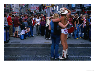 Naked Cowboy Performing For Tourists In Times Square, New York City, United States Of America by Corey Wise Pricing Limited Edition Print image