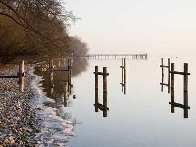 Pier And Icy Lake In Winter by Lilian Henglein Pricing Limited Edition Print image