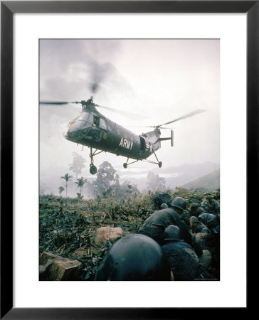 American Helicopter H-21 Hovering Above Soldiers In Combat Zone During Vietnam War by Larry Burrows Pricing Limited Edition Print image