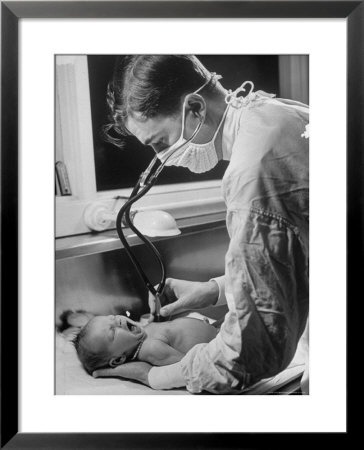 Intern At Minneapolis General Hospital Listening With Stethoscope To Newborn Baby's Heartbeat by Alfred Eisenstaedt Pricing Limited Edition Print image