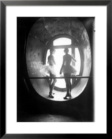 Two Ballerinas Standing In Window Of The Paris Opera During Rehearsal Of Swan Lake by Alfred Eisenstaedt Pricing Limited Edition Print image