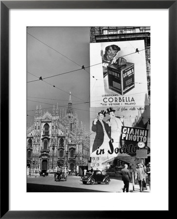 Billboard In The Piazza Del Duomo Features Abbott And Costello, Whom Italians Call Cianni E Pinotto by Alfred Eisenstaedt Pricing Limited Edition Print image