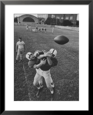 Players Don Mcclelland And Bobby Conrad During A Pre Season Practice Of Texas A And M Football Team by Joe Scherschel Pricing Limited Edition Print image