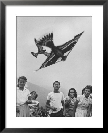 Children Playing With Various Flying Toys by Ralph Crane Pricing Limited Edition Print image