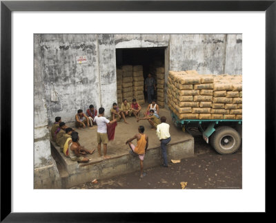Warehouse Workers Having Rest Break At Carrit Moran & Company's Tea Warehouses At Kolkata Port by Eitan Simanor Pricing Limited Edition Print image