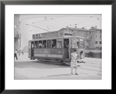 Passage Of A Tram On A Street In Bologna by A. Villani Pricing Limited Edition Print image