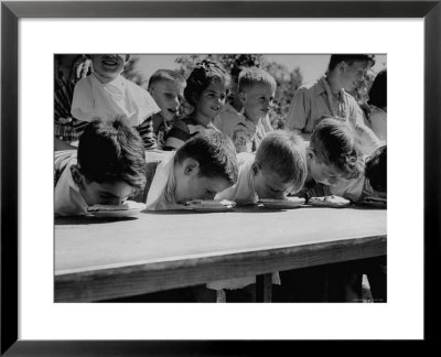 Pie Eating Contest During Church Social by Al Fenn Pricing Limited Edition Print image