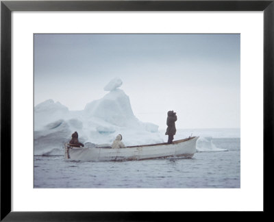 Nativa Alaskan Fishermen Hunters In Their Small Boat In The Icy Waters Of Alaska by Ralph Crane Pricing Limited Edition Print image